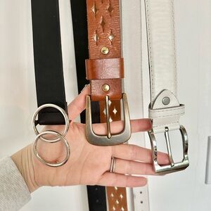 Three belts! Black, brown, and white